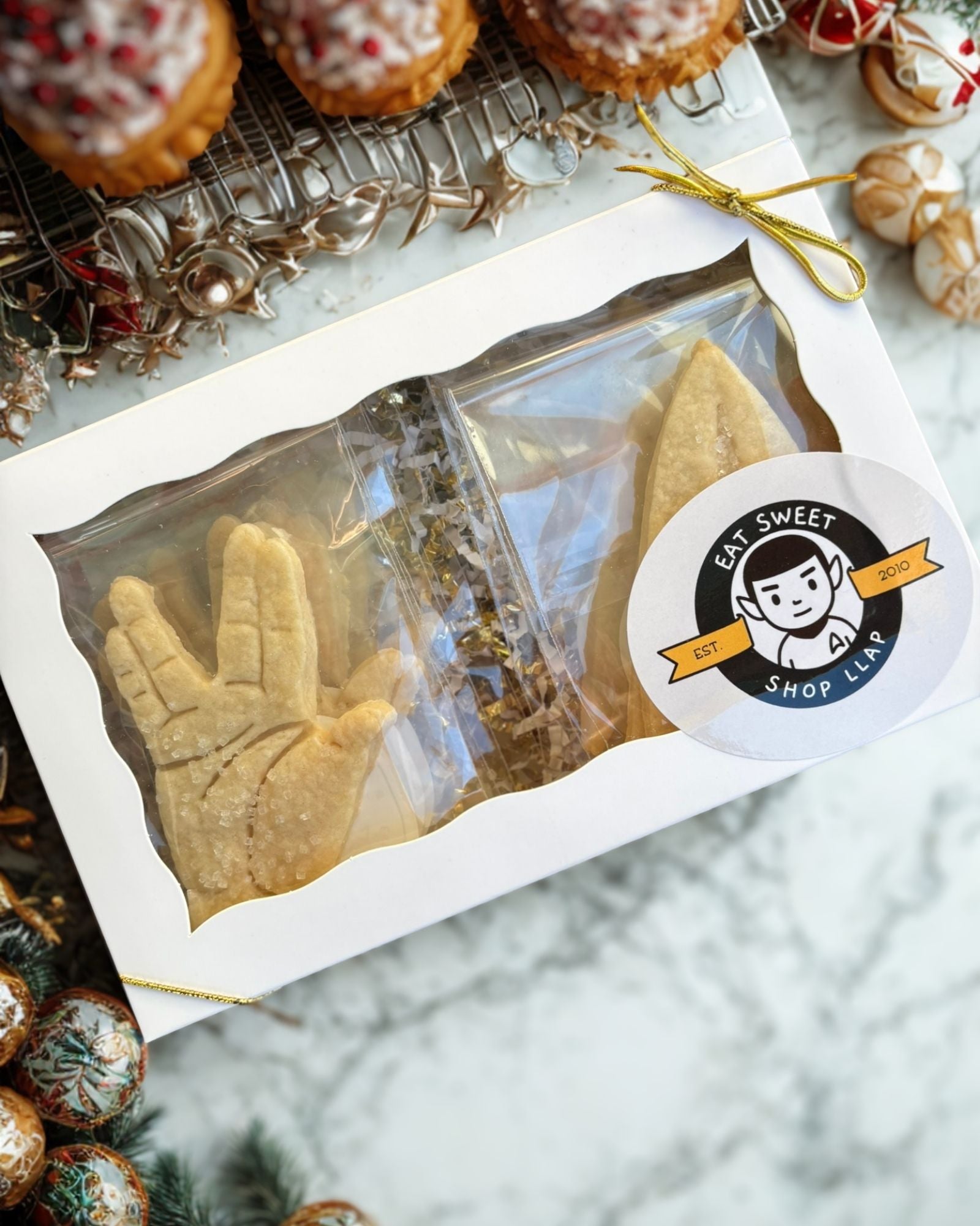 Packaged cookies with a visible brand label on a decorative surface